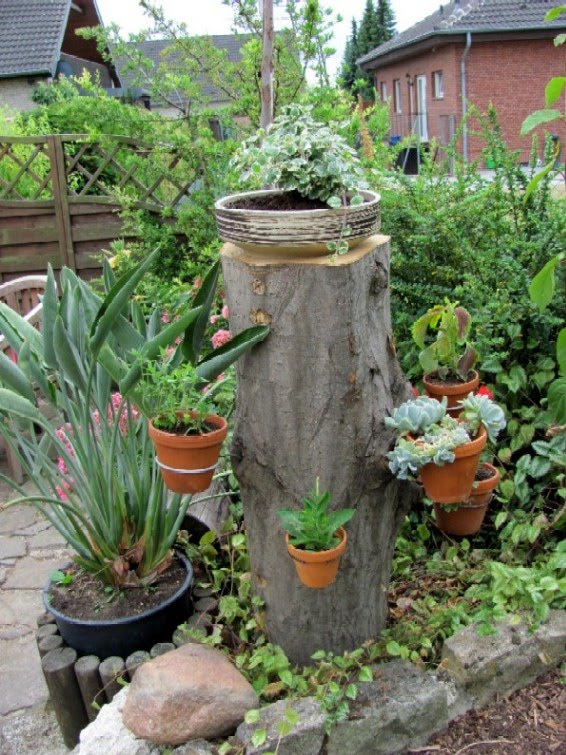 Rostartikel Für Garten Genial Gartenarbeit Ideen Baumstamm Als Blumenständer