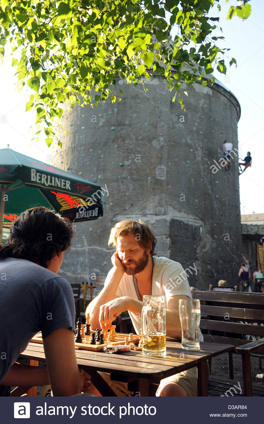 berlin germany men in the beer garden on the cassiopeia raw terrain D3AR84