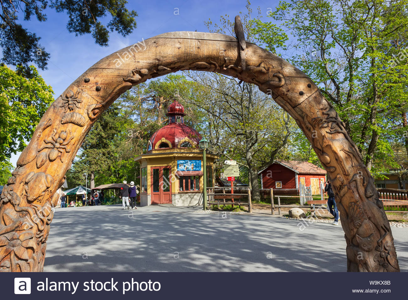 wooden sculpture with wildlife theme lill skansen zoo entrance gate a world for the kids where they can play and explore around park stockholm W9KX8B